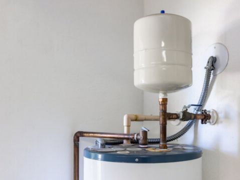 On The Way Plumbing installs expansion tanks to prevent pressure buildup and protect water heaters—pictured, a properly installed expansion tank