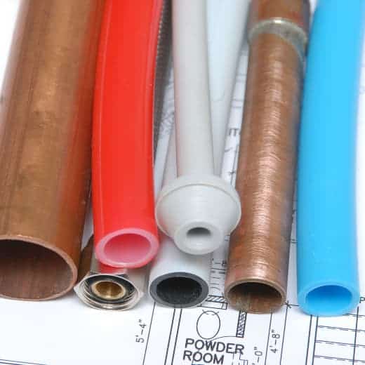 A variety of piping materials, including PEX and copper, displayed as options for whole-house repiping